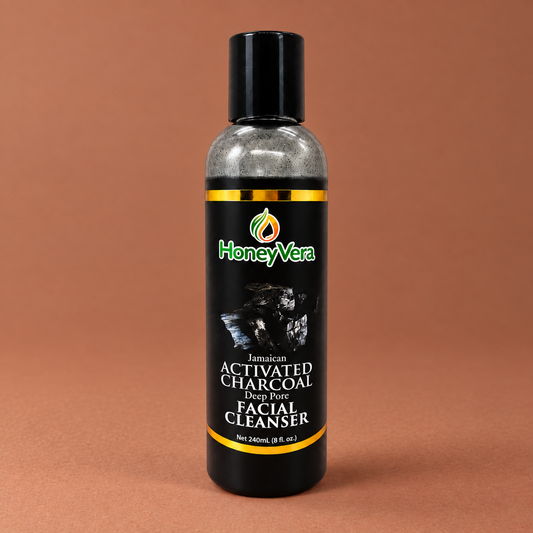 Activated Charcoal Deep Pore Cleanser on a warm brown studio background