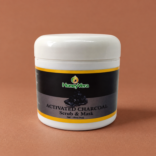 Activated Charcoal Scrub & Mask on a warm brown studio background