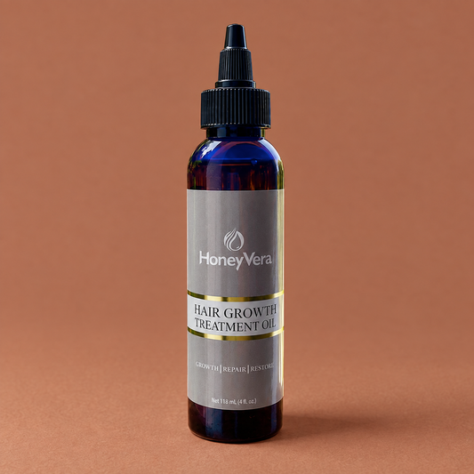 Hair Growth Treatment Oil on a warm brown background