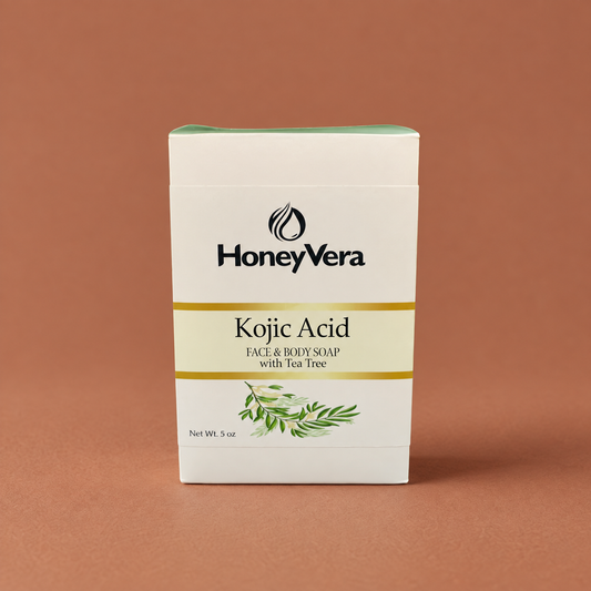 Kojic Acid Face & Body Soap with Tea Tree on a warm brown background