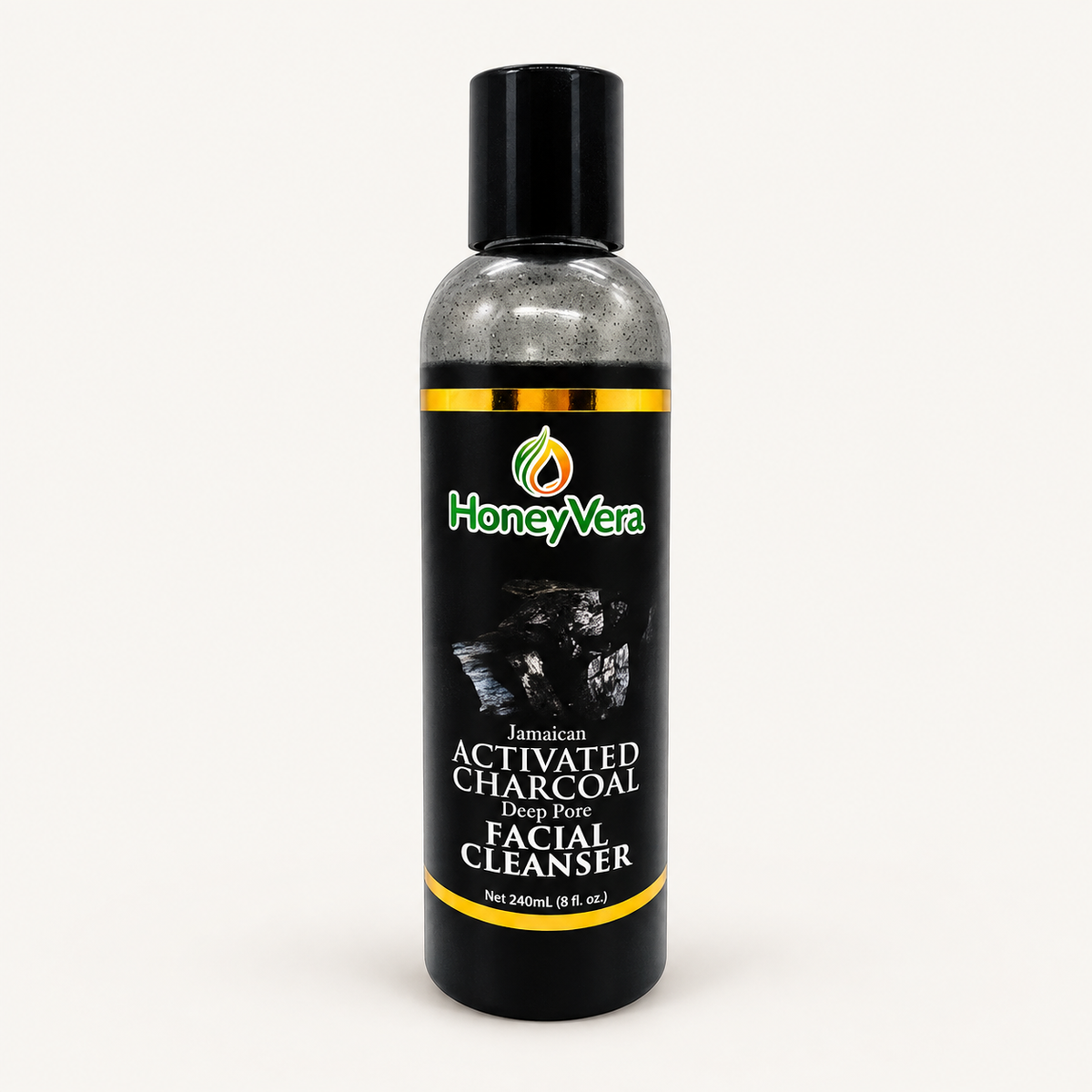 HoneyVera Activated Charcoal Deep Pore Facial Cleanser on a warm ivory background